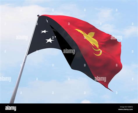 Papua New Guinea flag flying on clear sky Stock Photo - Alamy