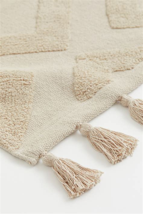 Tasselled bath mat - Light beige - Home All | H&M IN