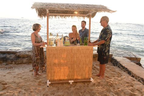 This portable Tiki Bar is easy to set up for a beach party and sturdy ...
