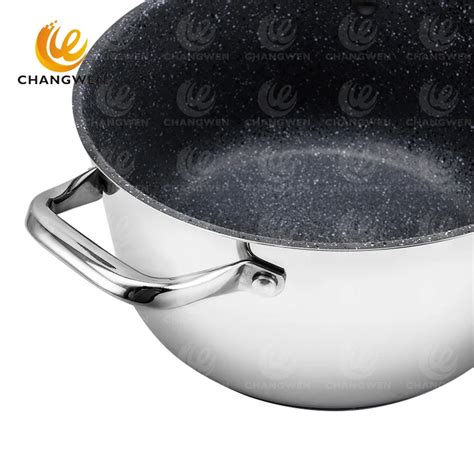 Nonstick stainless steel 8-piece cookware set with glass lid, polished stainless steel exterior ...