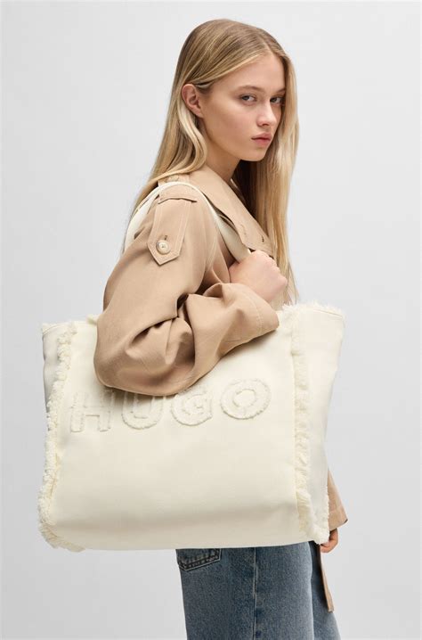 HUGO - Canvas tote bag with fringed trims - Natural