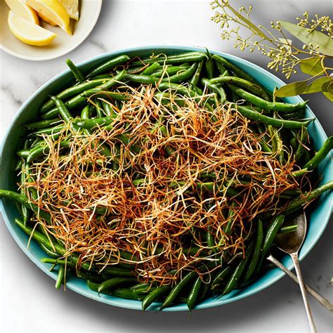 3-Ingredient Lemony Green Beans With Frizzled Leeks Recipe | Epicurious