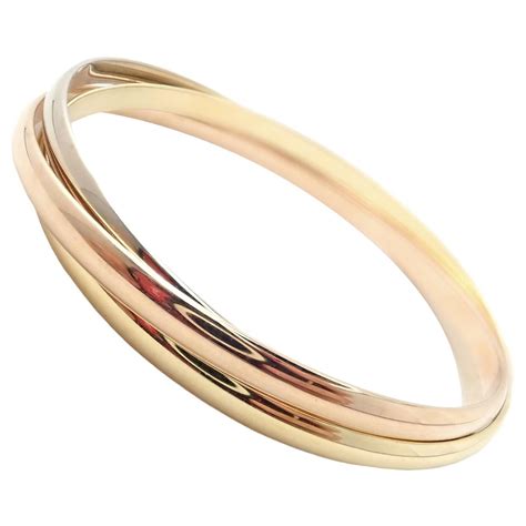 Cartier Trinity Rolling Tri-Colored Gold Bangle Bracelet at 1stDibs