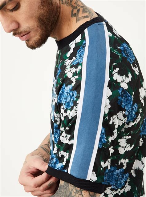 Buy Men Slim Fit Printed Athleisure T-shirt Online at just Rs. 599.0 ...