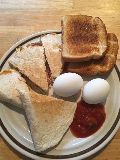 Breakfast for supper! Ham, cheese & scrambled egg quesadilla, toast ...
