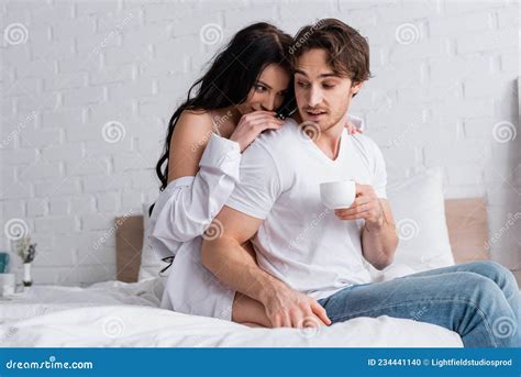 Brunette Woman Seducing Young Man Stock Photo - Image of caucasian ...