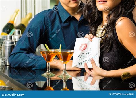 Asian Woman Seduces the Man in Restaurant Stock Photo - Image of flirt ...
