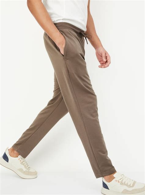 Buy Men Solid Athleisure Track Pants Online at just Rs. 699.0 ...
