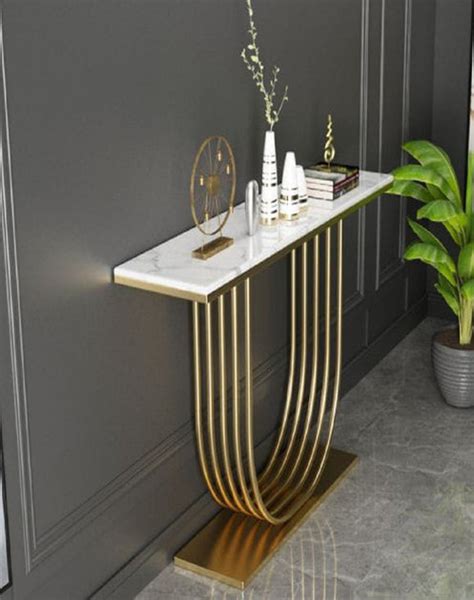 DAINTY GOLDEN FINISH CONSOLE TABLE – SUREKH DECOR