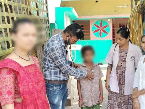 A girl child of a family working as a laborer in Sikka village of ...