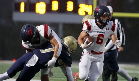 High school football: Springville punishes Skyline in steady rain ...
