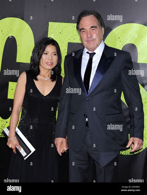 Oliver Stone and wife Sun-jung Jung attends "Savages" world premiere ...
