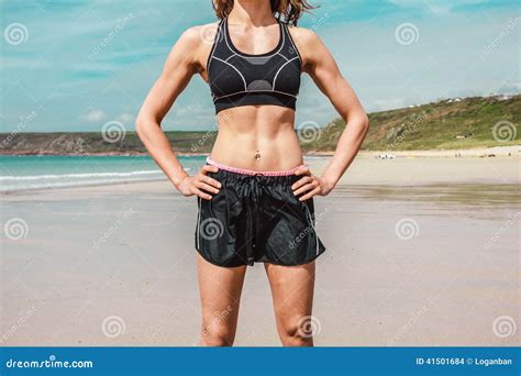Fit Young Woman With Toned Abs On Beach Stock Photo - Image: 41501684