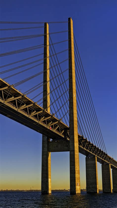 Download wallpaper 1350x2400 bridge, columns, river, water, horizon ...