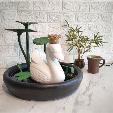 Buy table top buddha fountain | Elai Fountain with baby buddha – Greymode