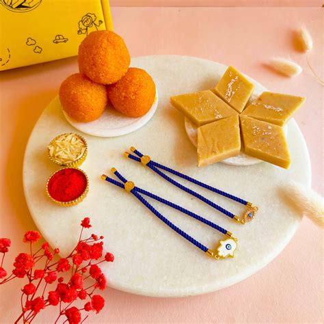 Buy Bandhan Bhai-Bhabhi Evil Eye Rakhi Set Online at SweeDesi