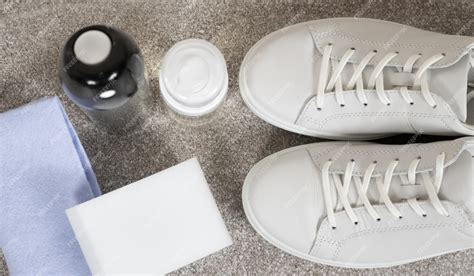 Premium Photo | White leather shoe cleaning kit waterrepellent spray ...