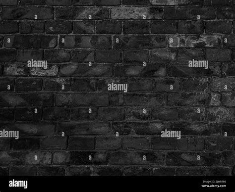 Dark black brick wall texture background Stock Photo - Alamy