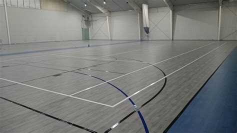 Tarkett Sports Omnisports 6.5 GreenLay in Grey Maple and Blue Maple at ...