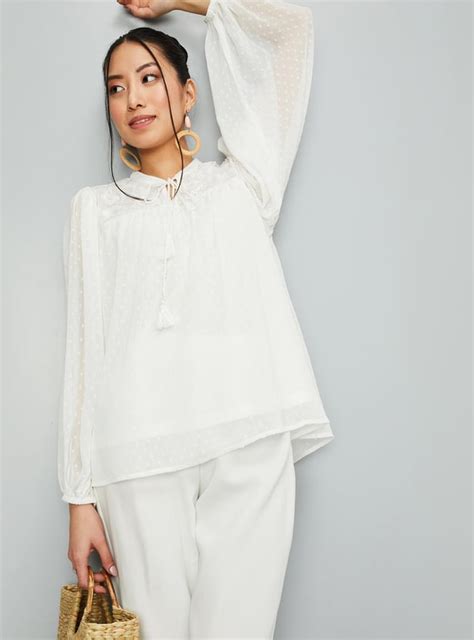 Buy Women Embroidered Tie-Up Neck Top Online at just Rs. 799.0 ...