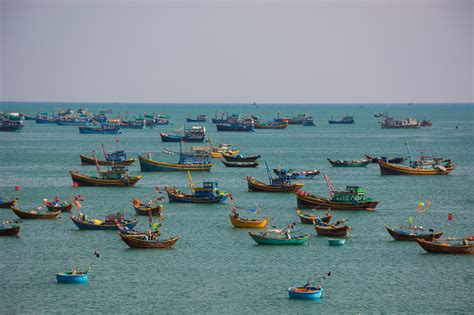 See related image detail. Vietnamese Fishing Village With Traditional Colorful Fishing Boats At ...