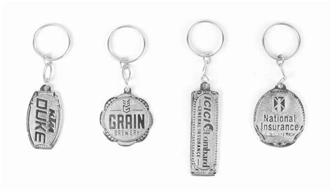 KEY CHAINS - Metal Golden Meena Keychain Manufacturer from New Delhi