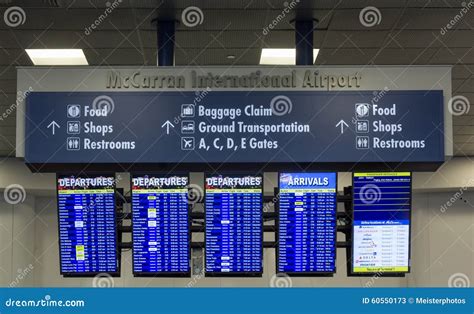 Departure and Arrival Screens at Airport in Vegas Editorial Stock Photo ...