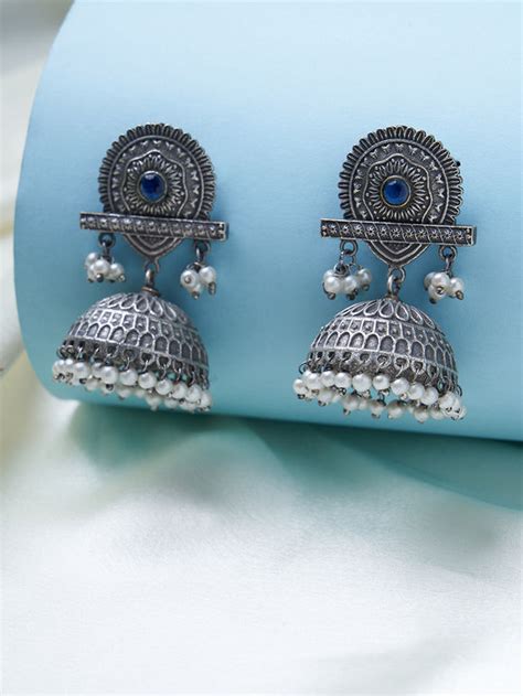 Silver-toned handcrafted brass accessories to shop online from the Loom