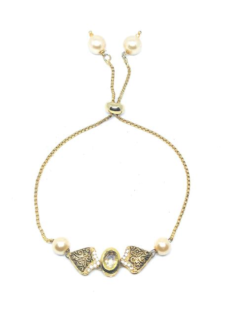 Get Gold Plated Oval Kundan Studded Eye Shape Bracelet Rakhi at ₹ 649 ...