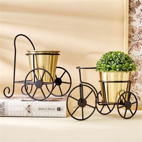 Buy Gloria Wheels Metal Trolley Planter from Home Centre at just INR 599.0