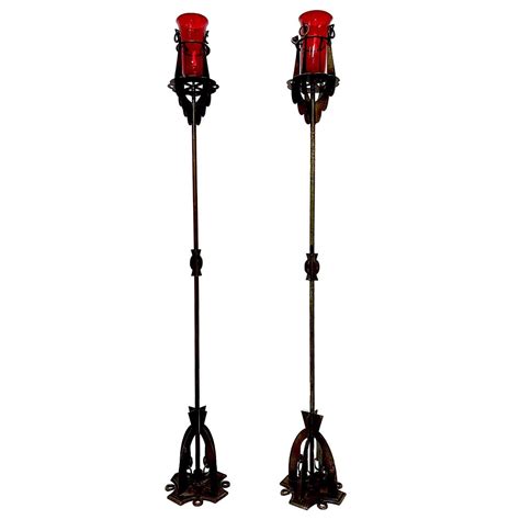 A pair of black wrought iron swing arm floor lamps at 1stDibs | black ...