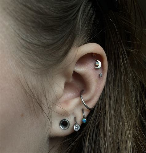 got new hoops for my second and third lobe piercings + this beautiful ...