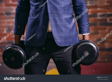 Muscle in Business Suit 的图像结果