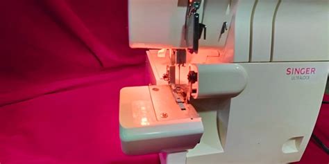 Image result for How to Thread Singer Ultralock