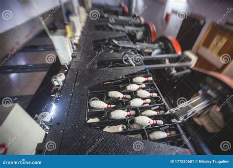 Image result for How Does a Bowling Pin Setting Machine Work