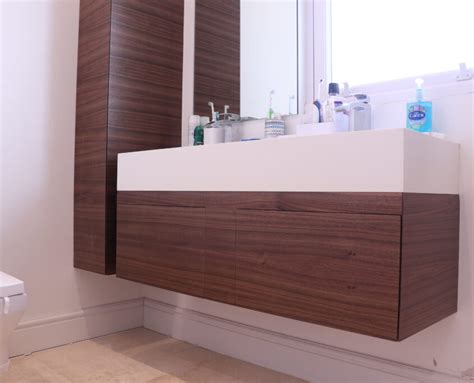https://www.bespokekitchensandfurniture.com/wp-content/uploads/2021/03/American-Black-Walnut-Floating-Bathroom-Unit-With-Push-To-Open-Drawers-6-845x684.jpg?utm_source=chatgpt.com