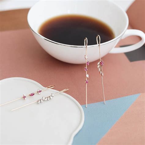 Alpheratz 0.63 CT Ruby and Diamond Cane Earring