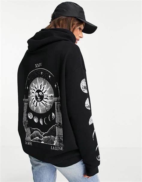 ASOS DESIGN oversized hoodie with solstice back graphic in black | ASOS ...