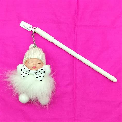 penhouse.in White Color Ball Pen With White Color Baby Doll Key chain ...