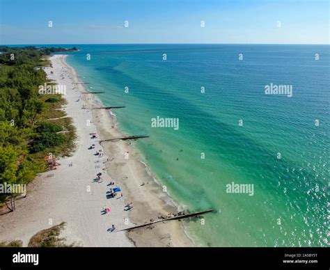 Aerial view of Coquina Beach white sand beach and turquoise water in ...