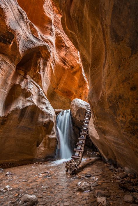 Kanarraville Falls inside a canyon after a hike for a few hours ...