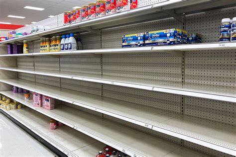 A baby formula display sits nearly empty at a Target store in Orlando.
