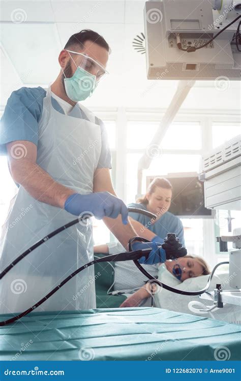 Internist Doctors during Stomach Examination Stock Photo - Image of healthcare, practitioner ...