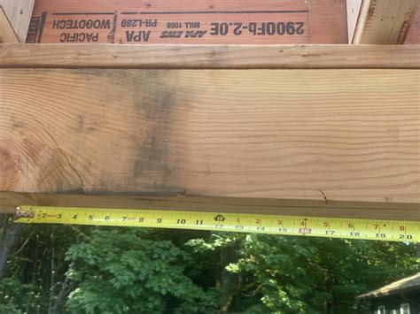 Split in garage door header. Leave it or replace : r/Construction