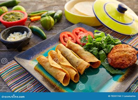 Mexican Flautas Rolled Tacos with Salsa Stock Photo - Image of ...