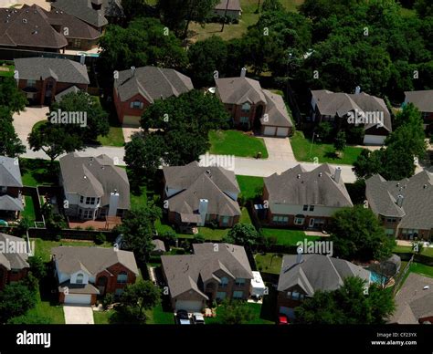 Aerial view of suburbs in Dallas-Ft Worth metroplex. Texas has population growth in the last 20 ...