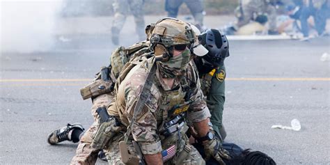 Using helicopters and chemical agents, immigration agents become ...