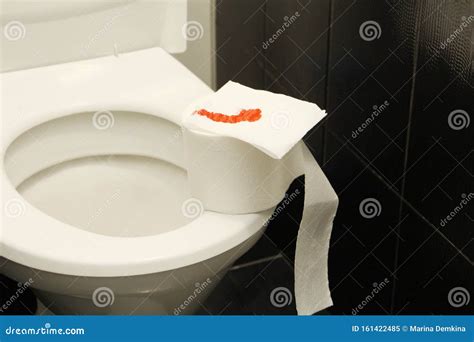 A Roll of Toilet Paper with Blood Lies on the Toilet Stock Image - Image of roll, bleeding ...