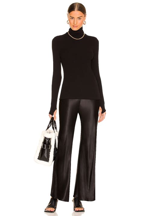 Enza Costa Sweater Knit Long Sleeve Turtleneck in Black | REVOLVE