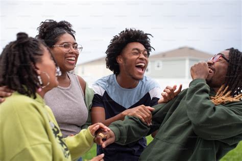 Group of People Standing and Talking Laughing 的图像结果